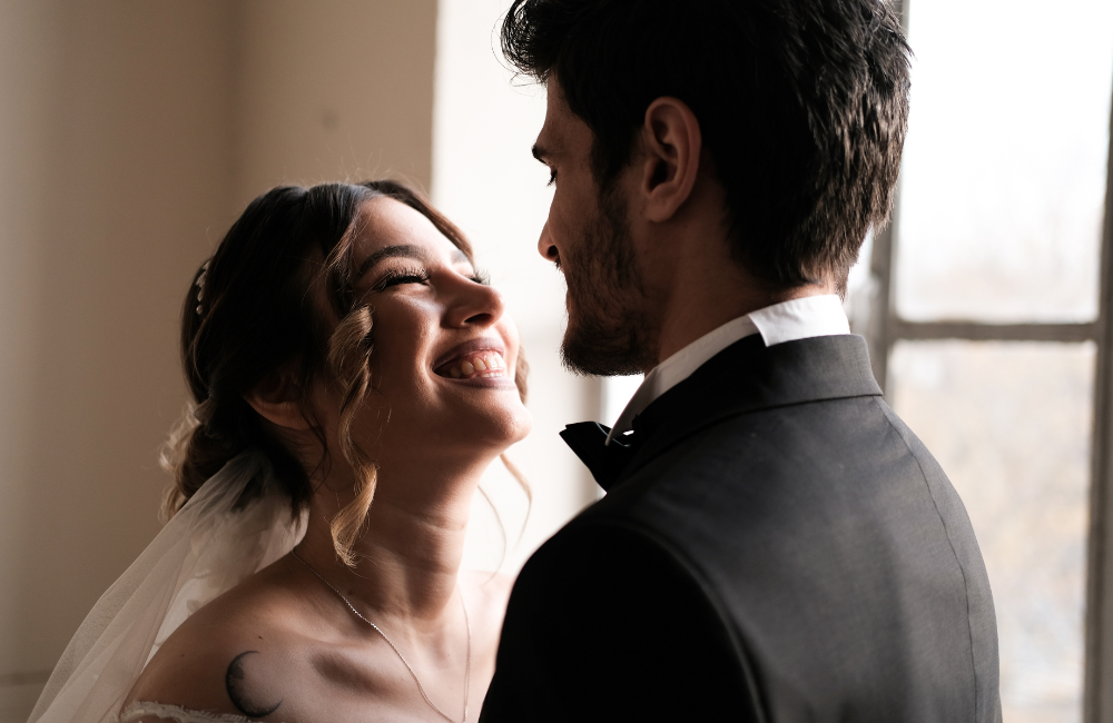 bride and groom looking at each other