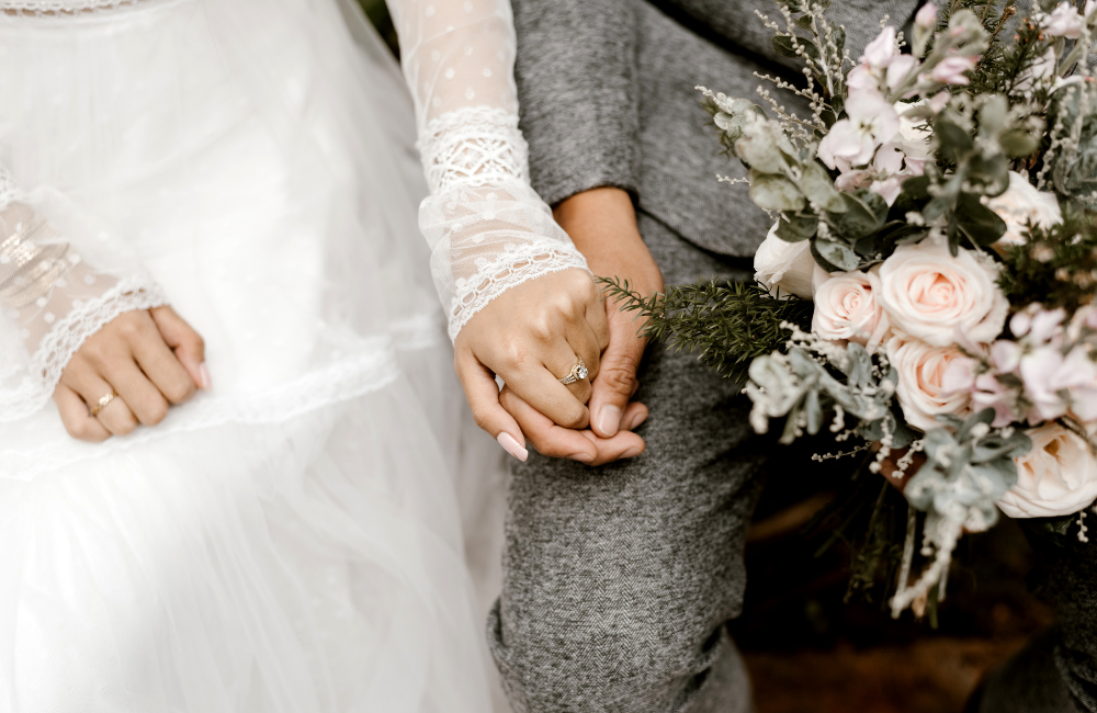 wedding couple holding hands